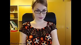 A Seductive Brunette With Spectacles Stripping And Performing On Webcam - Proxycams.Com