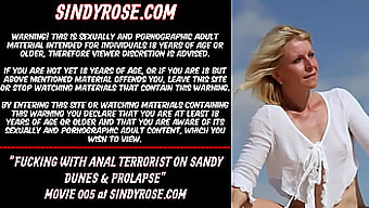 Sindy Rose And Anal Terrorist Engage In Extreme Dildo Play On Sandy Terrain